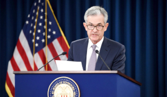 Investors await Fed rate decision